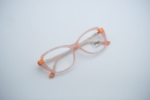 Transparent pink marbled acetate women's eyeglasses with orange temple tips front view original